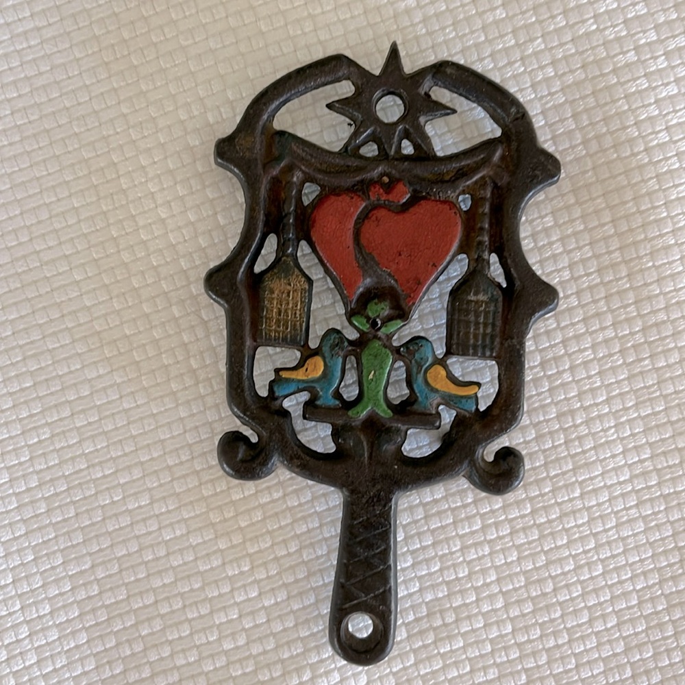 Cast iron trivet hearts and birds